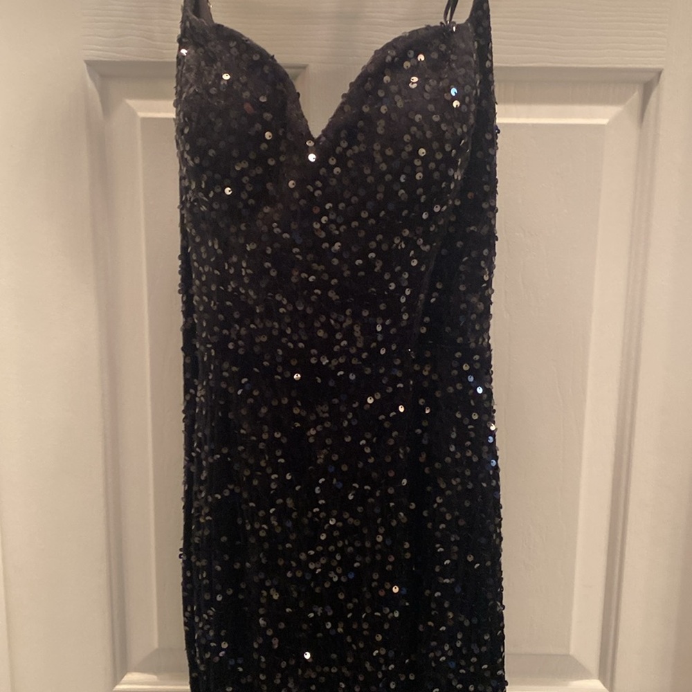Black ladies sequin gown. Great shape. Worn once. Mermaid style, small train.